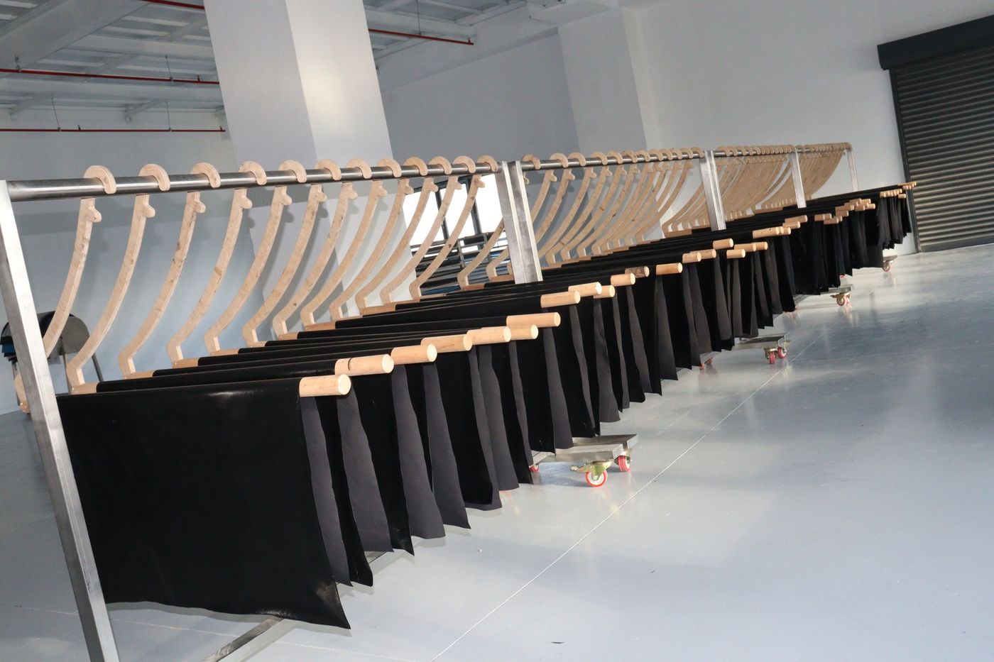 Freshly harvested LUNAFORM™ sheets hanging in rows to dry