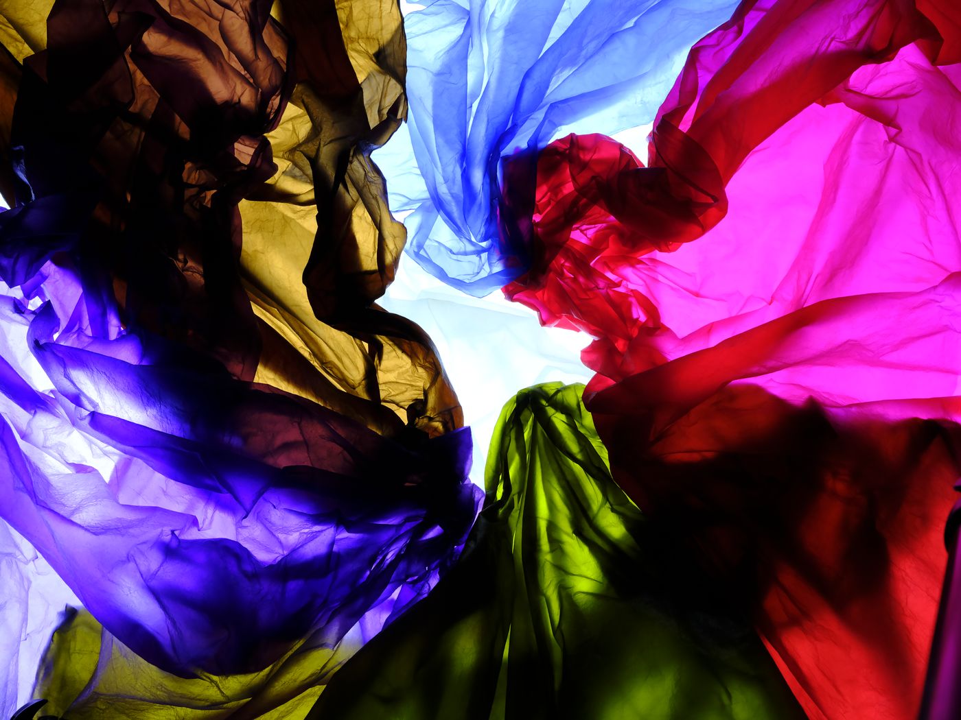 LUNAFORM™ Translucent — sheer cyan material draped in light