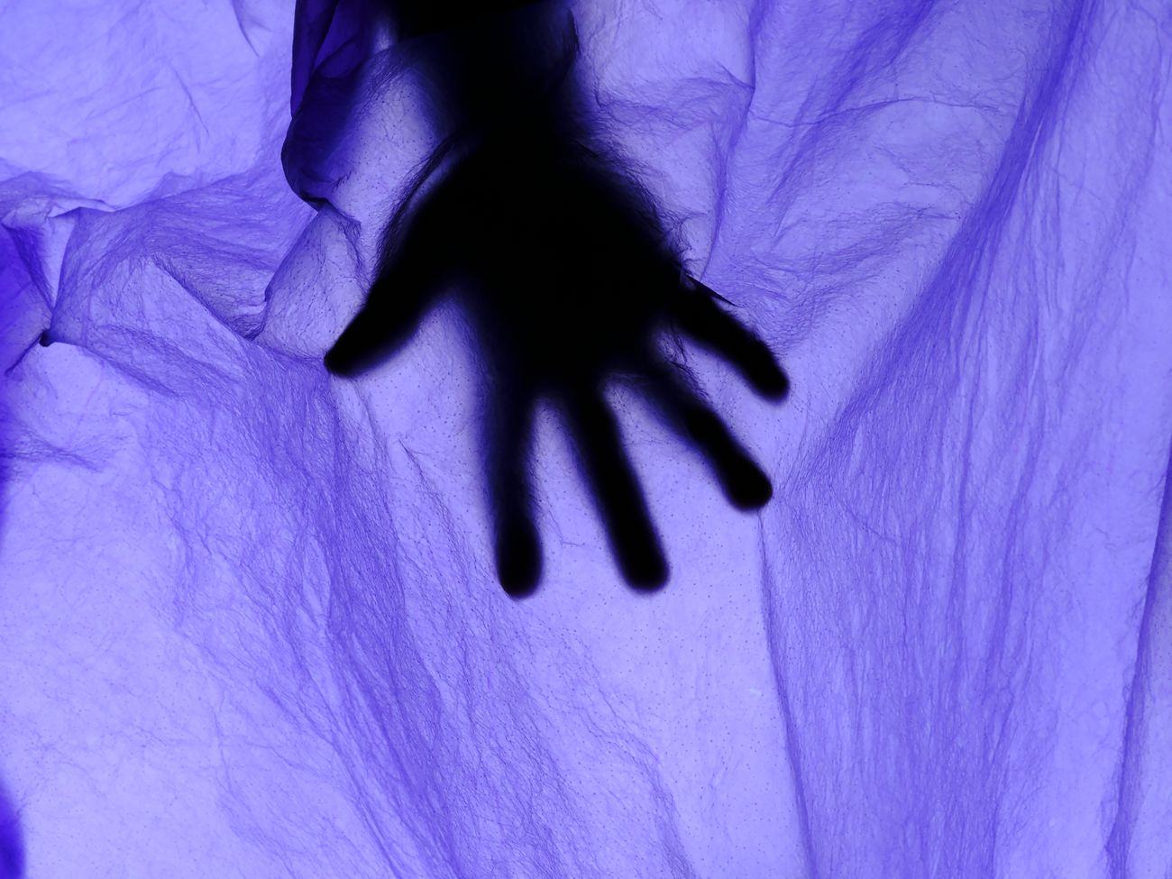 Hands working with vivid translucent LUNAFORM™ material